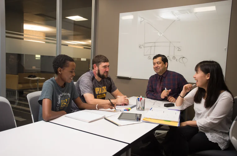 Students meeting in a conference room