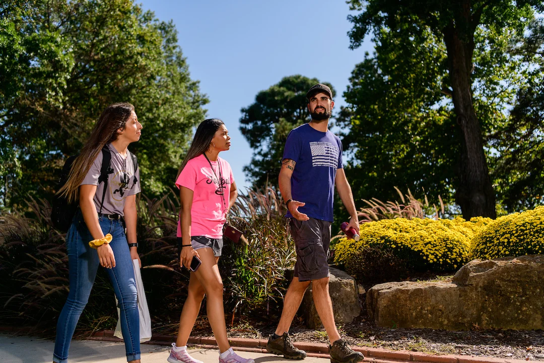 Students walking in front of Plumb Hall