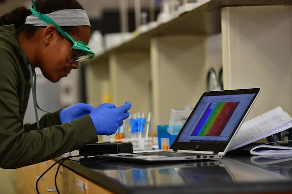 Student performing research in Emporia State University Biochemistry Lab