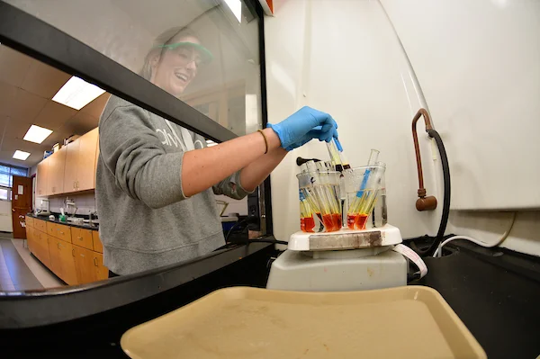Student performing research in Emporia State University Biochemistry Lab