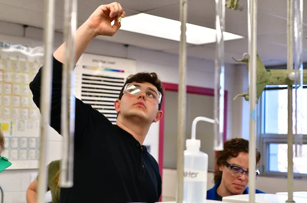 Student performing research in Emporia State University Biochemistry Lab