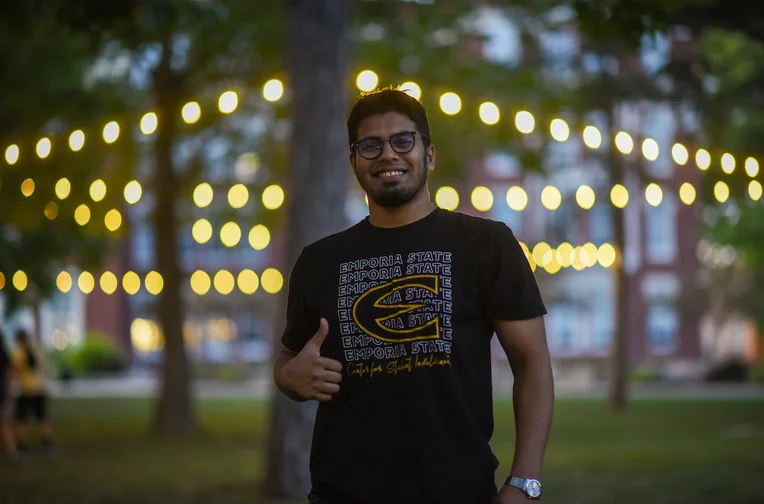 Emporia State University student giving thumbs up