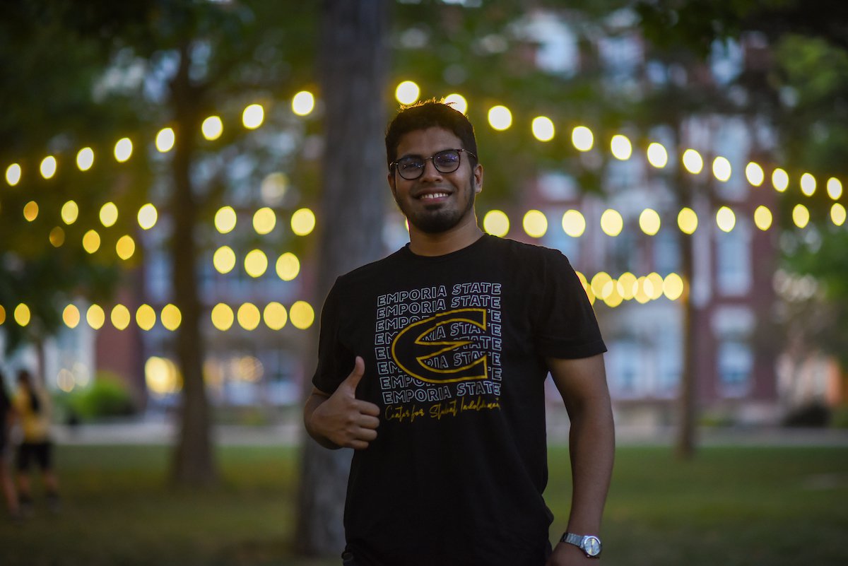 Emporia State University student giving thumbs up