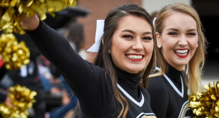 Emporia State cheerleaders smiling