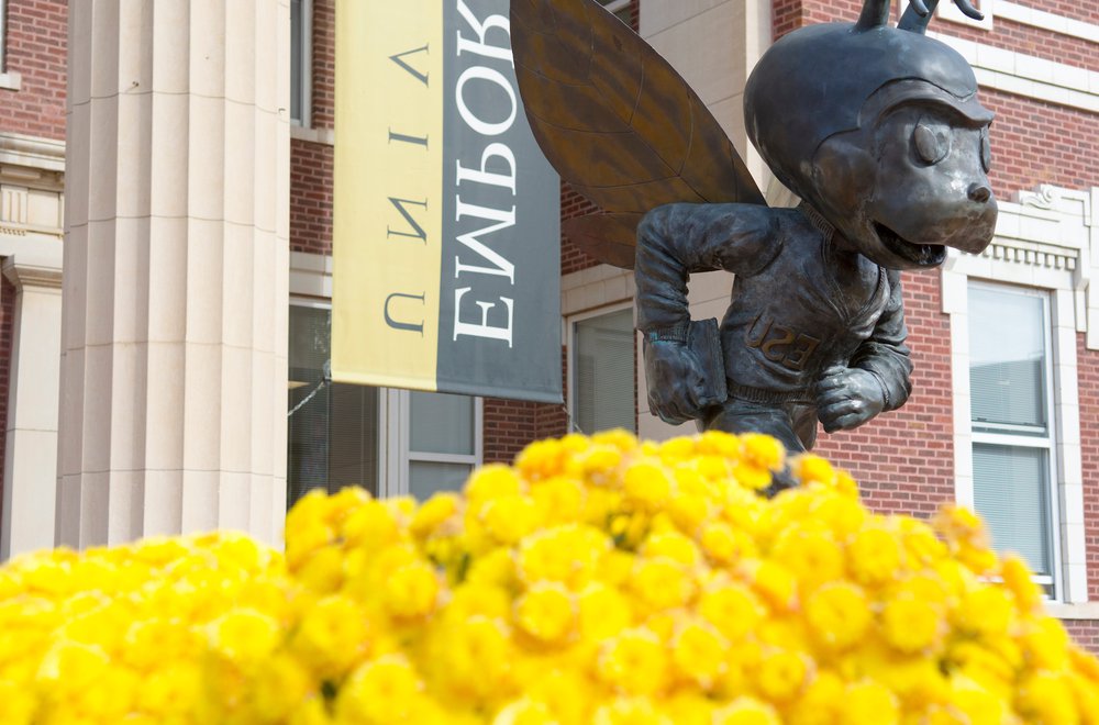 Emporia State' Mascot Corky in front of Plumb Hall