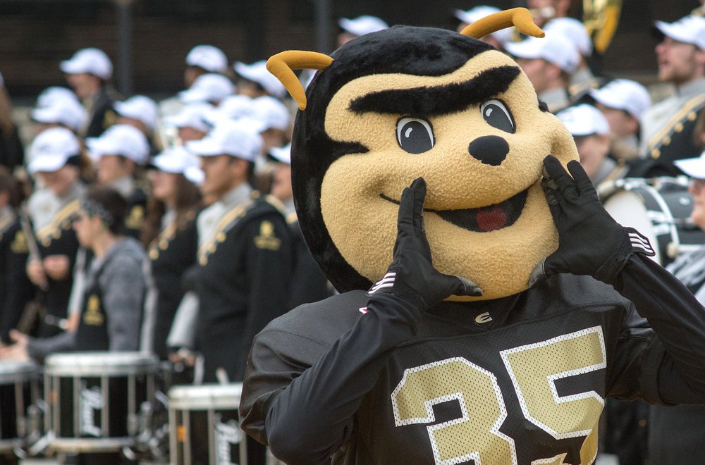 Emporia State mascot, Corky, cheering during game