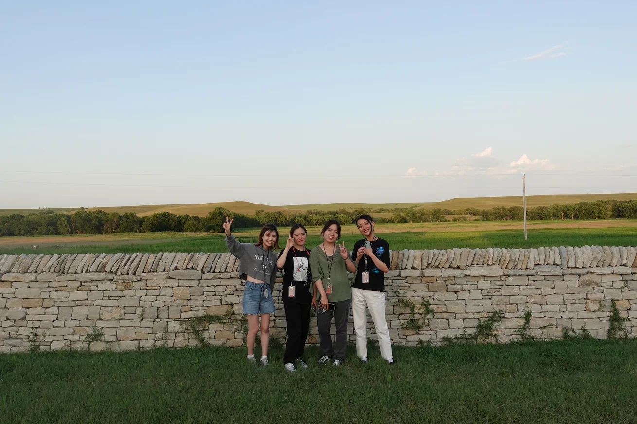 Summer Institute Students pose for photo in the Kansas Flint Hills