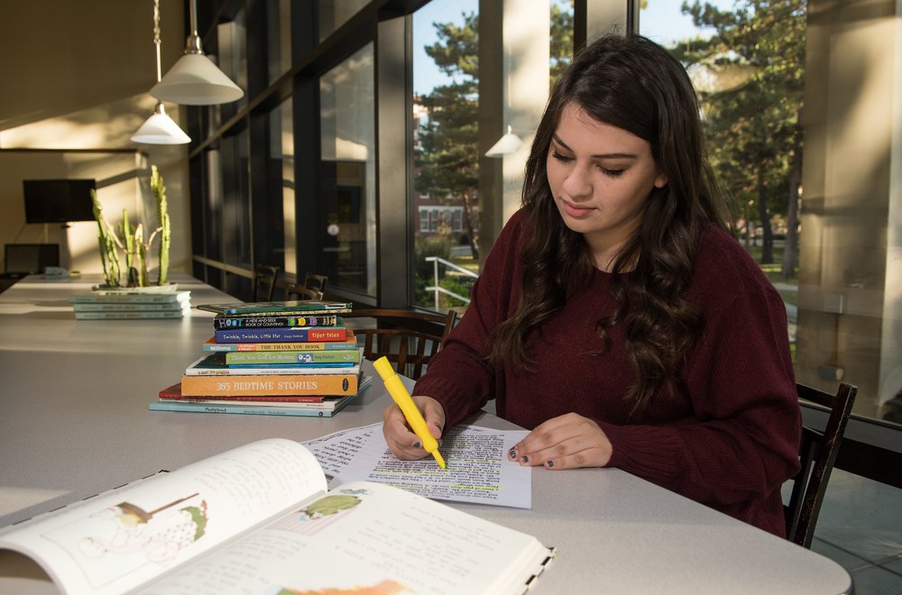Student studying in William Allen White Library