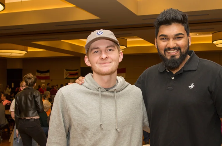 Students posing for photos at International Food Festival