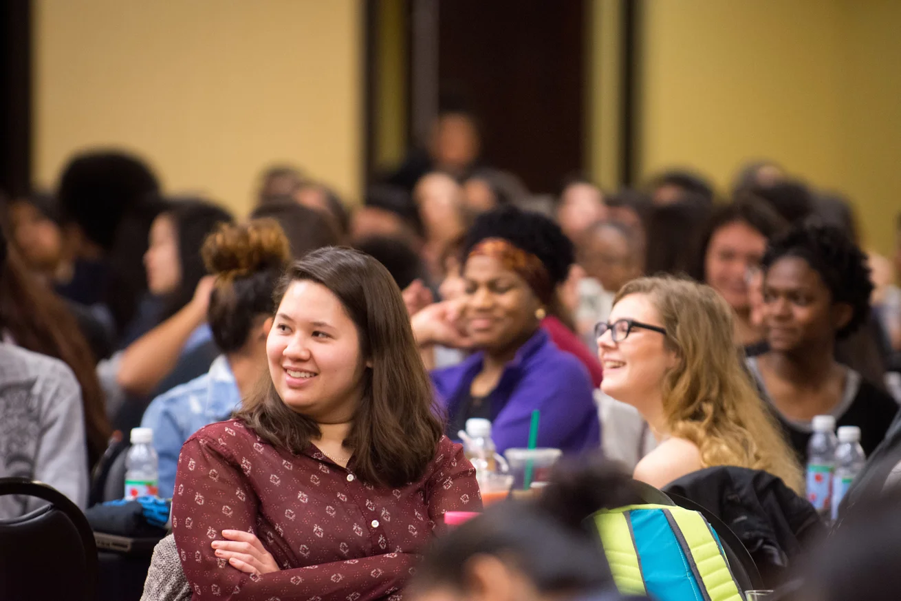 Group of Emporia State students listening to speaker