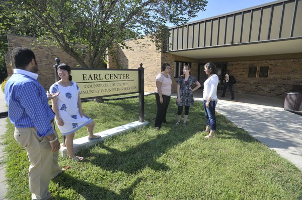 Students standing in front of the Earl Center