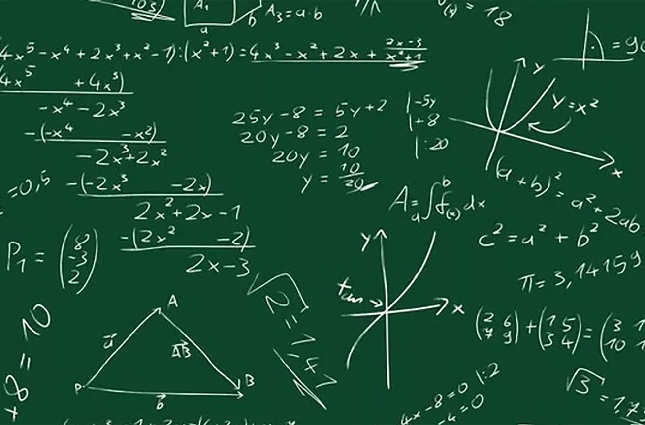 Math formulas written on chalkboard