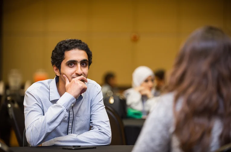 Emporia State student sitting at table