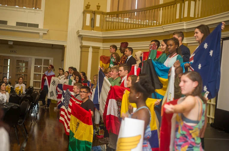 Emporia State University students holding flags of home countries